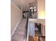 Interior view of a staircase leading to an open upper level, offering a glimpse into the bedrooms at 2270 Goodwood Se Blvd, Smyrna, GA 30080