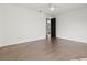 Spacious bedroom featuring hardwood floors, recessed lighting, and a modern ceiling fan for comfort at 56 Pine St, Roswell, GA 30075