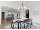 Open-concept dining room with views of kitchen and living room at 56 Pine St, Roswell, GA 30075