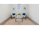 Cozy sitting area with modern chairs, decorative pillows, and stylish table at 56 Pine St, Roswell, GA 30075