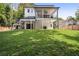 Expansive backyard featuring a well-maintained lawn and a multi-level deck great for entertaining guests at 159 E Wesley Ne Rd, Atlanta, GA 30305