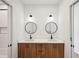 Modern bathroom with dual sinks, wood cabinets and sleek design at 159 E Wesley Ne Rd, Atlanta, GA 30305