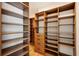 Walk-in closet with custom shelving and drawer storage for ample organization at 159 E Wesley Ne Rd, Atlanta, GA 30305