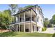 Stunning exterior elevation showcasing a multi-level deck and patio perfect for enjoying the outdoors at 159 E Wesley Ne Rd, Atlanta, GA 30305