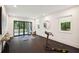 Bright home gym with treadmill, yoga mats, and sliding glass doors to an outdoor area at 159 E Wesley Ne Rd, Atlanta, GA 30305