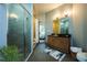 Well-lit bathroom showing a walk-in shower, soaking tub, and spacious vanity with modern features at 5300 Peachtree Rd # 503, Atlanta, GA 30341
