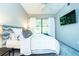 Bright bedroom with large window, plush carpet, and comfortable bed at 5300 Peachtree Rd # 503, Atlanta, GA 30341