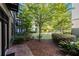 Charming courtyard with lush landscaping, brick-paved area, and inviting outdoor space at 5300 Peachtree Rd # 503, Atlanta, GA 30341