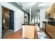Open-concept kitchen with stainless appliances, granite countertops, and modern fixtures at 5300 Peachtree Rd # 503, Atlanta, GA 30341
