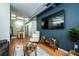 Inviting living room features hardwood floors, stylish decor, and a modern entertainment center at 5300 Peachtree Rd # 503, Atlanta, GA 30341
