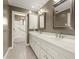 Large bathroom with dual sinks and plenty of room for storage in the closets at 6 Westchester Sq, Decatur, GA 30030