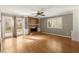 Bright living room with hardwood floors, brick fireplace, and natural light at 6 Westchester Sq, Decatur, GA 30030