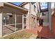 Screened-in porch with brick floor, connecting to the backyard and house at 6 Westchester Sq, Decatur, GA 30030