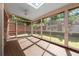 Inviting screened porch offering views of the landscaped backyard at 6 Westchester Sq, Decatur, GA 30030