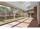 Enclosed porch featuring tile floors and large windows for natural light at 6 Westchester Sq, Decatur, GA 30030