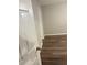 Clean bedroom featuring wooden floors and neutral paint, providing a serene and welcoming space at 9161 Fairway Ct, Riverdale, GA 30274