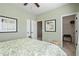 Comfortable bedroom featuring soft green walls and a doorway to the closet at 106 Asher Dr, Carrollton, GA 30116