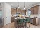 Well-designed kitchen featuring stainless appliances, stone countertops, and a large island at 106 Asher Dr, Carrollton, GA 30116