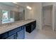 Modern bathroom boasts granite countertops, double sinks, and a separate shower and tub at 3292 Mill Forest Sw Dr, Conyers, GA 30094