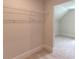 Walk-in closet featuring ample shelving for efficient storage solutions at 3292 Mill Forest Sw Dr, Conyers, GA 30094