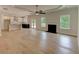 Open concept living area featuring a kitchen, fireplace, and French doors leading to the patio at 3292 Mill Forest Sw Dr, Conyers, GA 30094