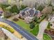Beautiful brick house with manicured lawn and mature trees at 3821 Teesdale Ct, Atlanta, GA 30350