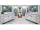 Bright bathroom with double vanities and marble flooring at 3821 Teesdale Ct, Atlanta, GA 30350