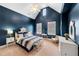 Stylish bedroom with high vaulted ceilings, natural light, and tasteful decor offers a relaxing retreat at 3821 Teesdale Ct, Atlanta, GA 30350