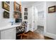 Functional office area with a built-in desk, wood floors, and stylish cow print desk chair at 3821 Teesdale Ct, Atlanta, GA 30350