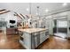 Spacious kitchen with stainless steel appliances, a wine fridge, and hardwood floors at 3821 Teesdale Ct, Atlanta, GA 30350