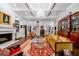 Spacious living room with a fireplace, classic furnishings, and hardwood floors at 3821 Teesdale Ct, Atlanta, GA 30350