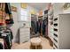 Well-organized walk-in closet with shelves and drawers, offering storage and style at 3821 Teesdale Ct, Atlanta, GA 30350