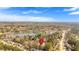 A high-angle shot displays the community, nearby lake, and landscape, providing a scenic sense of place at 713 Shore Ln, Lithonia, GA 30058