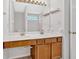 Bathroom vanity with double sinks and under-cabinet storage at 713 Shore Ln, Lithonia, GA 30058