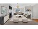 Cozy living room featuring a fireplace, modern decor, and a comfortable seating arrangement at 713 Shore Ln, Lithonia, GA 30058