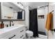 Updated bathroom features modern fixtures, white subway tile, and a sleek vanity at 1 Biscayne Nw Dr # 211, Atlanta, GA 30309