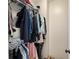 Walk in closet with plentiful storage racks at 1 Biscayne Nw Dr # 211, Atlanta, GA 30309