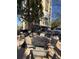 Outdoor deck with dining set and BBQ, great for entertaining overlooking a community pool at 1 Biscayne Nw Dr # 211, Atlanta, GA 30309