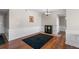 Open dining space with hardwood floors, wainscoting, and access to other rooms at 1 Biscayne Nw Dr # 211, Atlanta, GA 30309