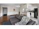 Cozy living room offers an open layout to the kitchen at 1 Biscayne Nw Dr # 211, Atlanta, GA 30309