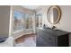 Bedroom featuring a neutral color palette, wood floors and windows allowing for an abundance of natural light at 1 Biscayne Nw Dr # 211, Atlanta, GA 30309