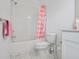 Bathroom features a shower with tub and white marble flooring at 3260 Bennett Creek Ln, Suwanee, GA 30024