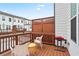 Relaxing patio area with grill, seating, and privacy screen at 3260 Bennett Creek Ln, Suwanee, GA 30024