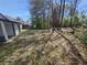 Spacious backyard featuring a mix of shade and sunlight, perfect for outdoor activities and relaxation at 5160 Avery St, Covington, GA 30014