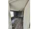 Freshly painted room with new floors, featuring an open layout, ideal for comfortable living and entertaining at 5160 Avery St, Covington, GA 30014