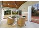 Relaxing back porch with a wood ceiling, a stylish fireplace, and outdoor seating at 1020 Pinedale Se Dr, Smyrna, GA 30080