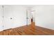 Bright bedroom features hardwood floors, neutral walls, and white doors, offering a serene and inviting space at 1020 Pinedale Se Dr, Smyrna, GA 30080