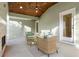Relaxing covered patio with a ceiling fan and an outdoor fireplace at 1020 Pinedale Se Dr, Smyrna, GA 30080