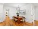 The dining room features a wood table and geometric lighting fixture at 1020 Pinedale Se Dr, Smyrna, GA 30080