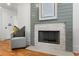 Stylish fireplace with a modern design adds warmth and character to the room at 1020 Pinedale Se Dr, Smyrna, GA 30080